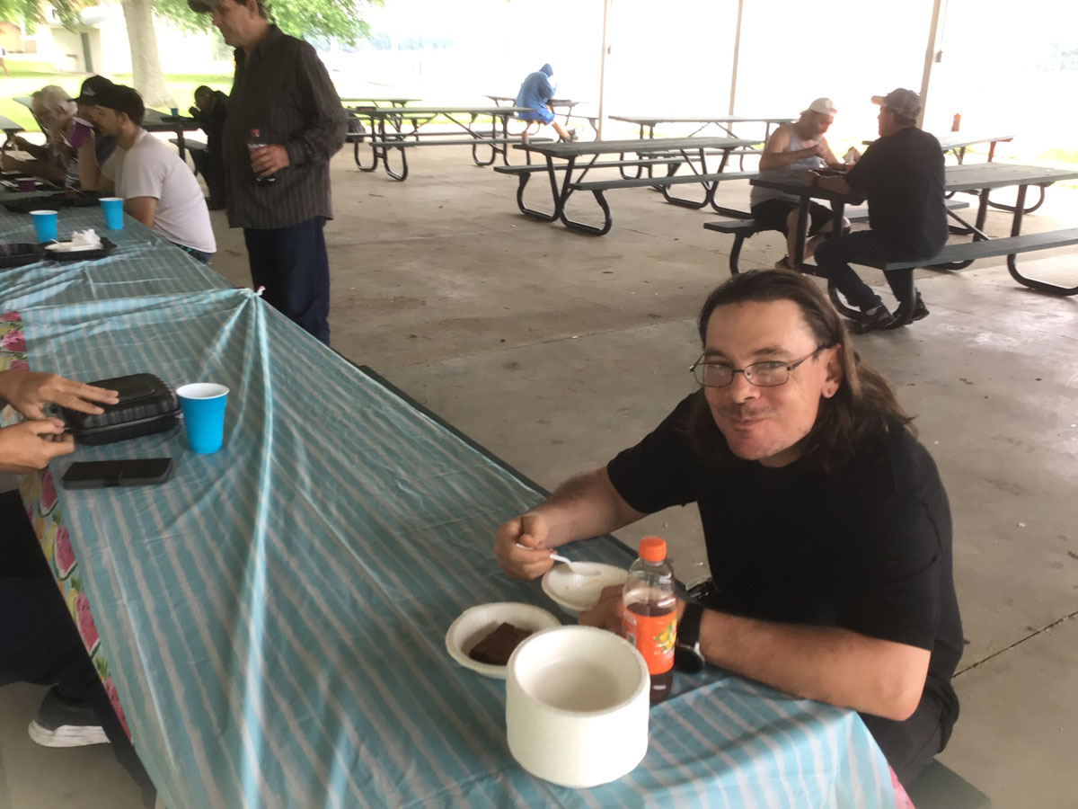 People eating food in Owensboro Kentucky from Food for the Soul