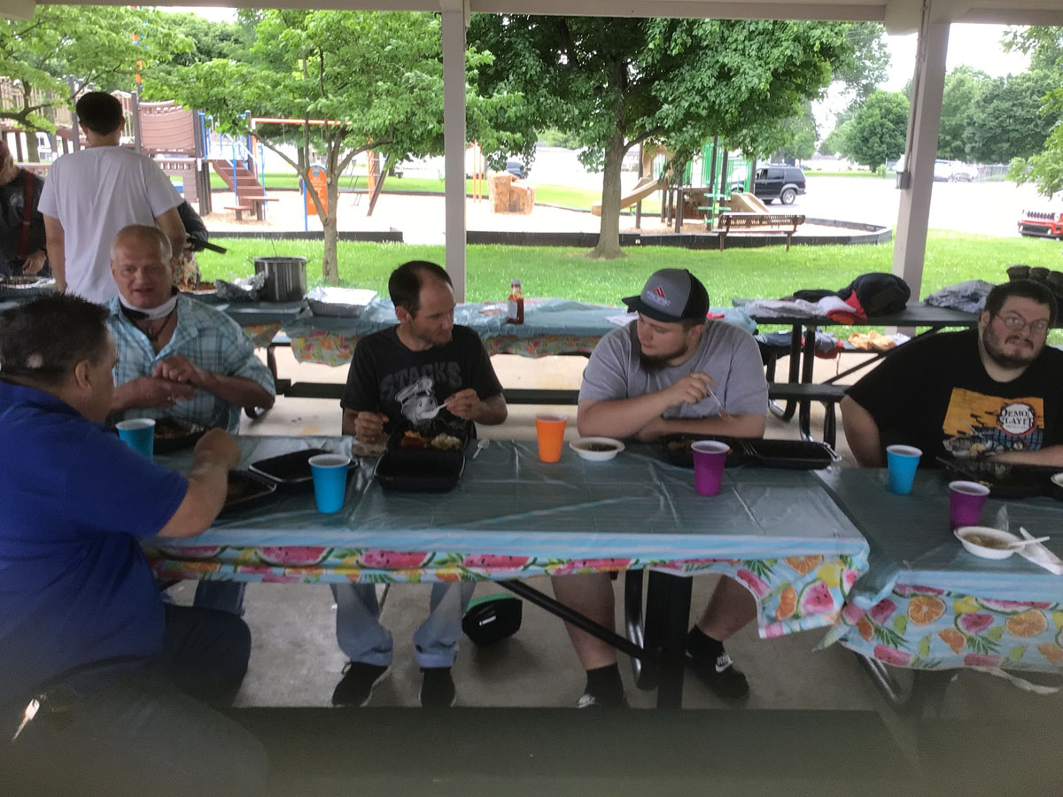 People eating food in Owensboro Kentucky from Food for the Soul